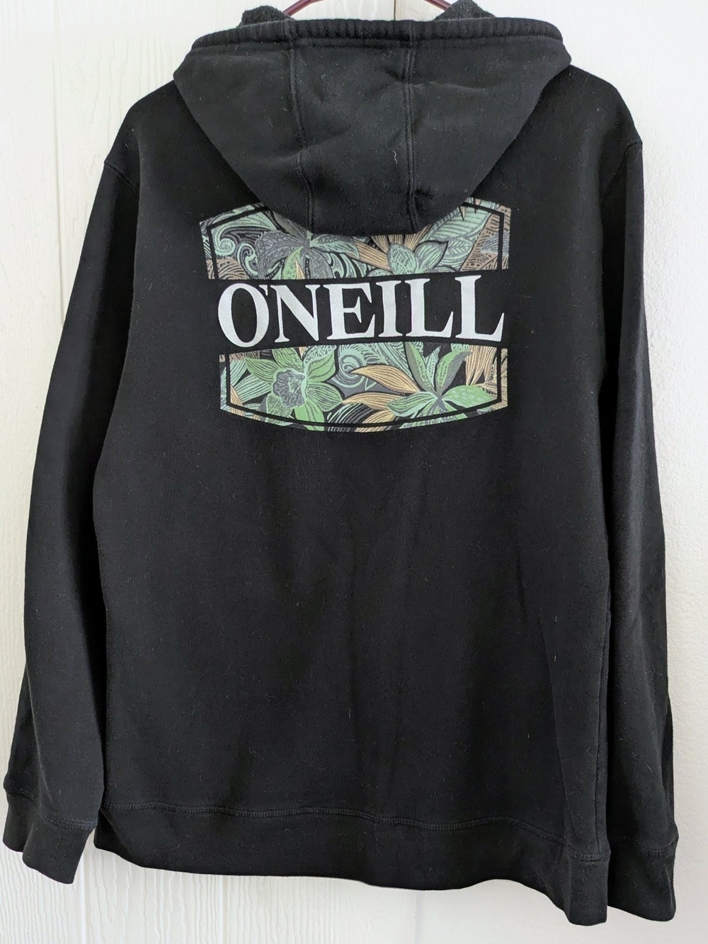O'Neill Black Zip-Up Hoodie with Green and Tan Floral Back Logo